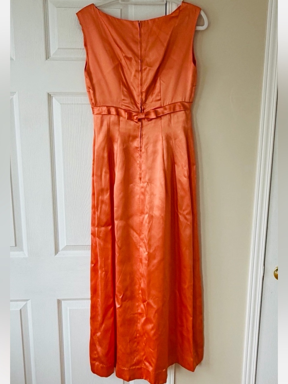 Elegant Orange Sleeveless Satin Maxi Dress with Bow Detail and Back Slit